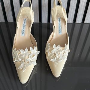 Manolo Blahnik Cream and White Slingback.  4 inch heel  US size 7